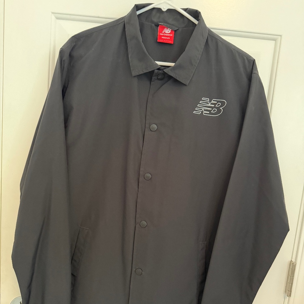 New without tags New Balance Coaches Varsity Snap Jacket Black - Size Medium